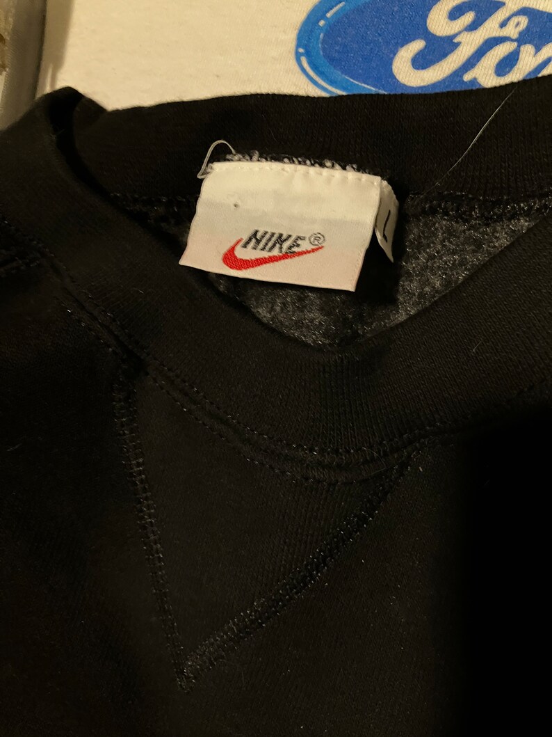 nike winnie the pooh crewneck