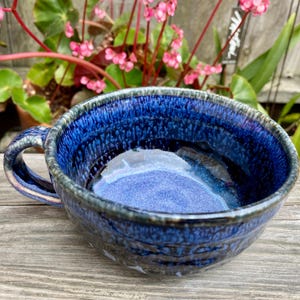 Porcelain cobalt blue melting over lavender soup mug - Faceted and footed, and comfy handle - Holds 15 ounces comforting soup - Nice gift!