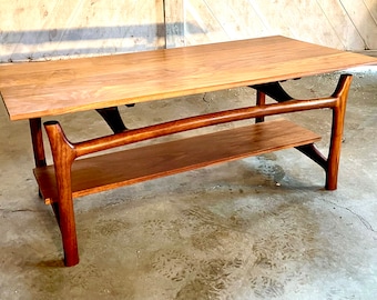 Walnut sculpted coffee table