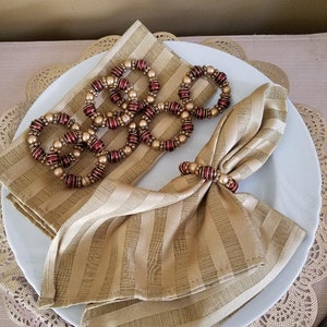 Gold and Bronze Napkin Ring Set (8)