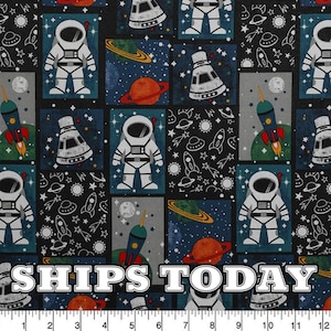 May include: A black and white fabric with a repeating pattern of astronauts, spaceships, planets, and stars. The fabric has a gray background with a blue and orange color scheme.