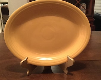 Fiesta 12 1/2” oval platters, 2 yellow platters, 1 green platter, excellent condition