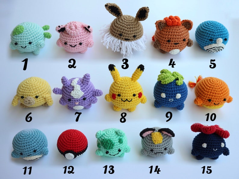May include: A collection of fifteen crocheted plush toys in various colors and designs. The toys are numbered 1 through 15 and include a variety of characters. The toys are handmade and appear to be part of a larger collection.