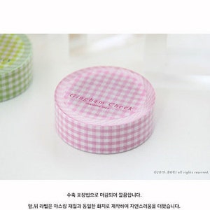 May include: Pink and white gingham patterned washi tape with the text "Gingham Check" printed on the tape.