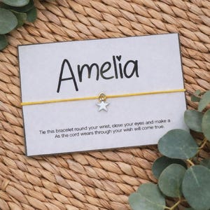 May include: A set of three ceramic mugs with a speckled, matte finish. The mugs are in shades of cream, light gray, and dark gray. Each mug has a simple, minimalist design, perfect for coffee or tea.