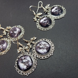 Goth gothic witchy oddity curiosity bizarre freak show side show &quot;Deadly Divine &quot; conjoined twin skeleton  earrings