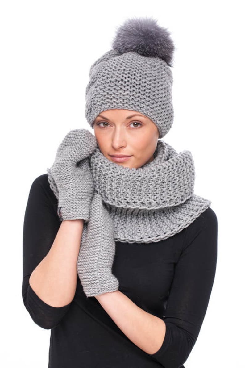 Handmade knitted grey wool hat with blue silver fox fur pom pom