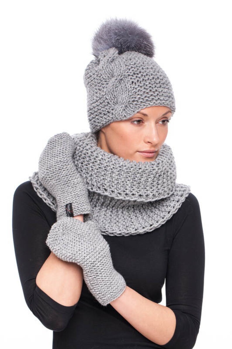 Handmade knitted grey wool hat with blue silver fox fur pom pom