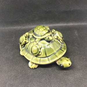 Green Pottery Turtle 6”, with moving head and feet.