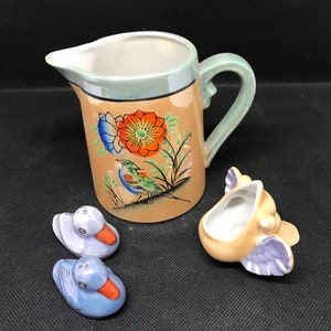 Lusterware creamer, shakers and ashtray set. Made in Japan