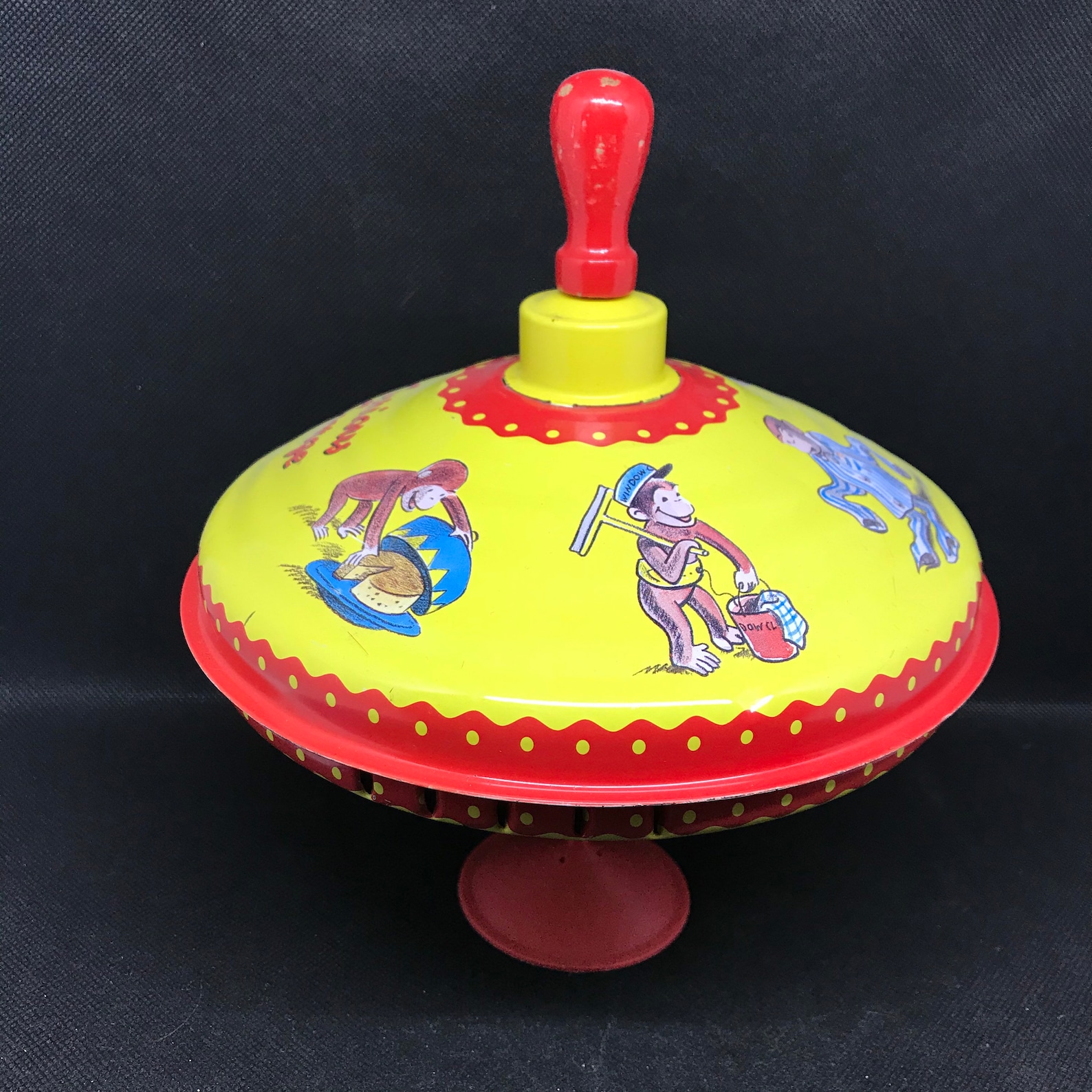 Vintage Curious George spinning top toy | Etsy