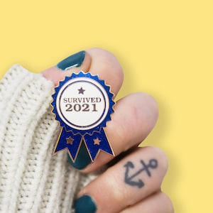 Survived 2021 Award Glitter Enamel Pin