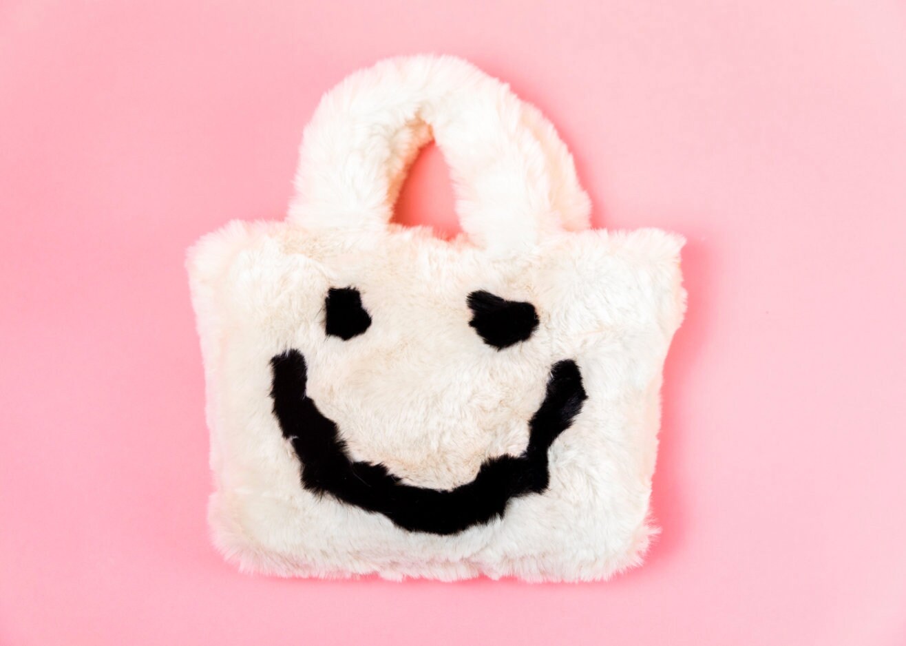 fluffy smiley face bag
