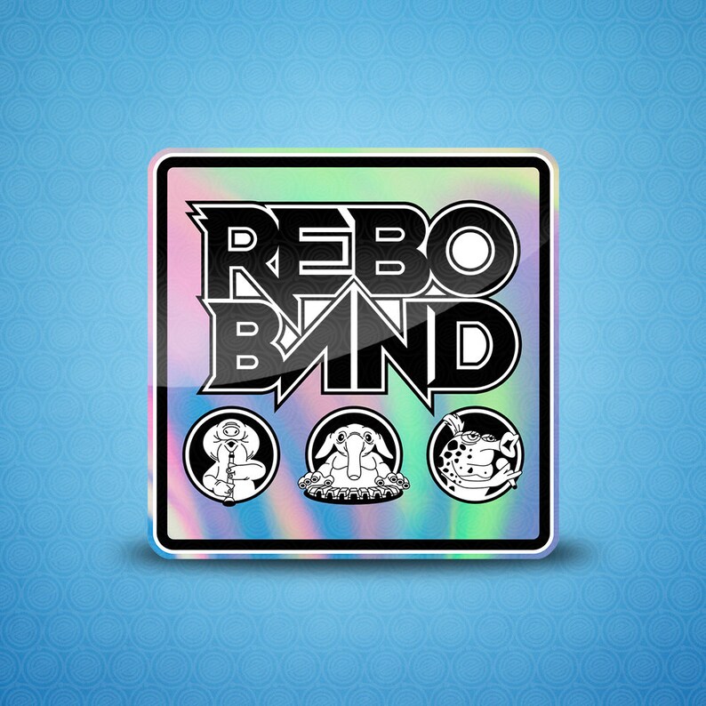 May include: A holographic sticker with the text "REBO BAND" in black letters. The sticker features three cartoon characters in black and white: a frog, a creature with a trunk, and a creature with a clarinet.