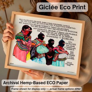 May include: Gicl&eacute;e Eco Print on archival hemp-based paper. The artwork depicts four figures in colorful attire, their faces partially obscured. Text in Spanish is included. The print is displayed in a wooden frame, with the text "Frame shown for display only - actual frame options differ."