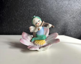 Napco October Pixie on Cosmos Flower Figurine