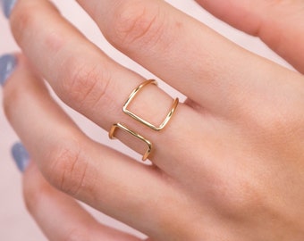 Sterling Silver Round Diamond Bisected Parallel Bar Band Ring 0.09 Cttw Sterling Silver Round Diamond Bisected Parallel Bar Band Ring 0.09 Cttw