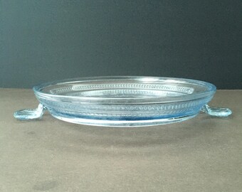 Fire King Transparent Sapphire Blue Round Trivet with (2) Handles
