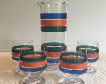 Glass Pitcher with Four matching Footed Glasses with Blue and Orange Stripes