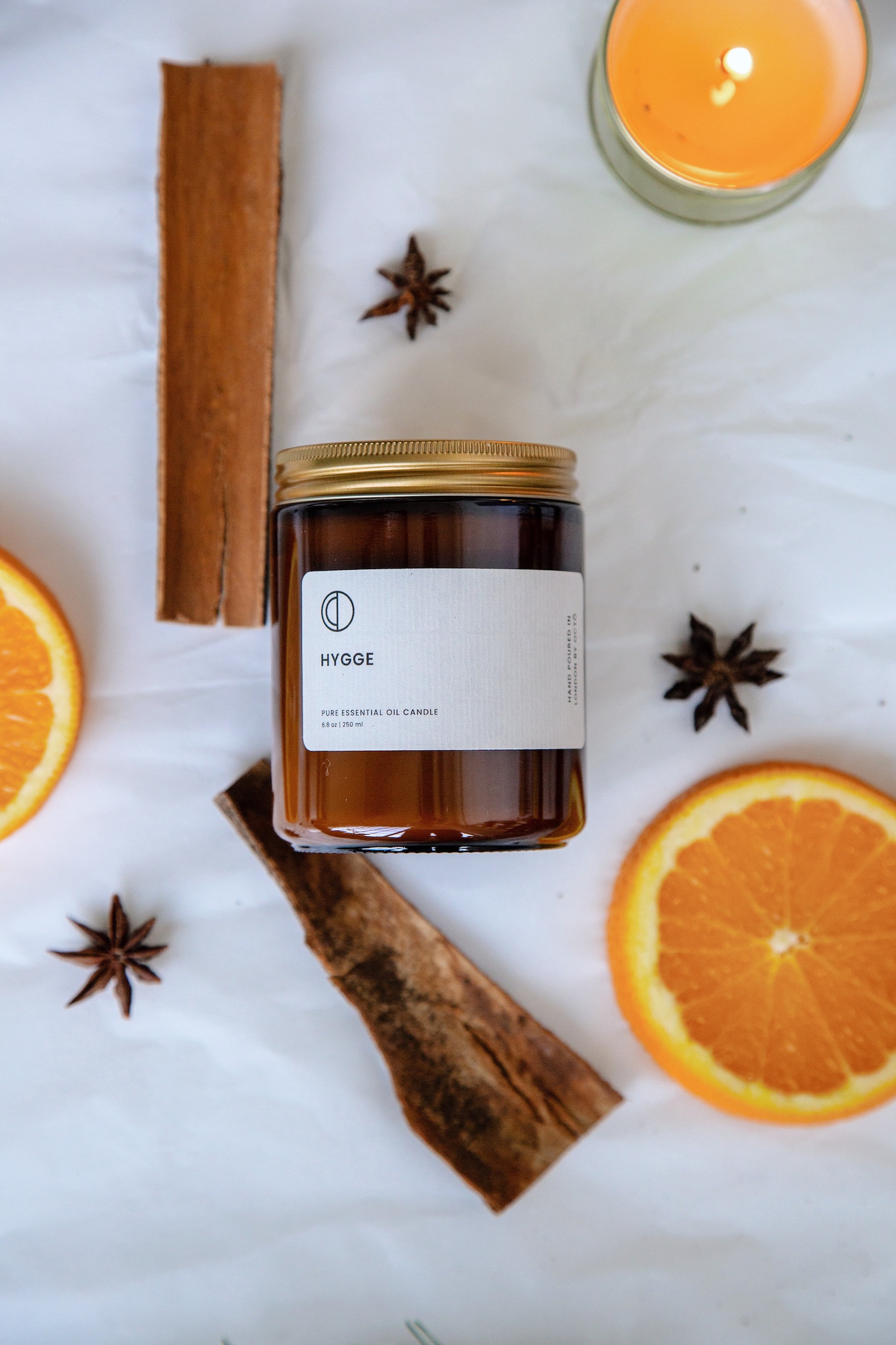 Hygge - Cinnamon, Clove, Nutmeg, Orange, Ginger essential oil candle. soy wax candle in amber jar