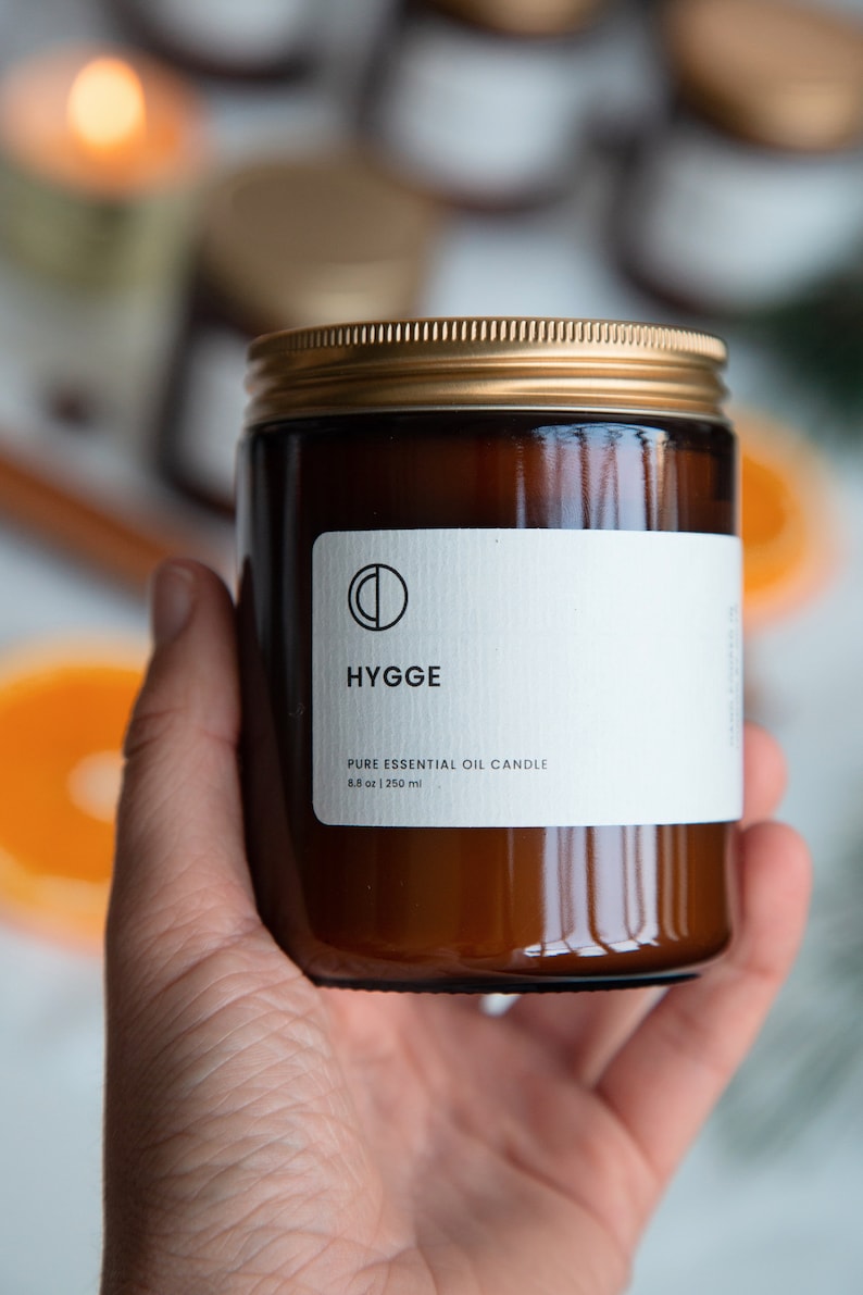 Hygge Cinnamon, Clove, Nutmeg, Orange, Ginger essential oil candle. soy wax candle in amber jar image 3