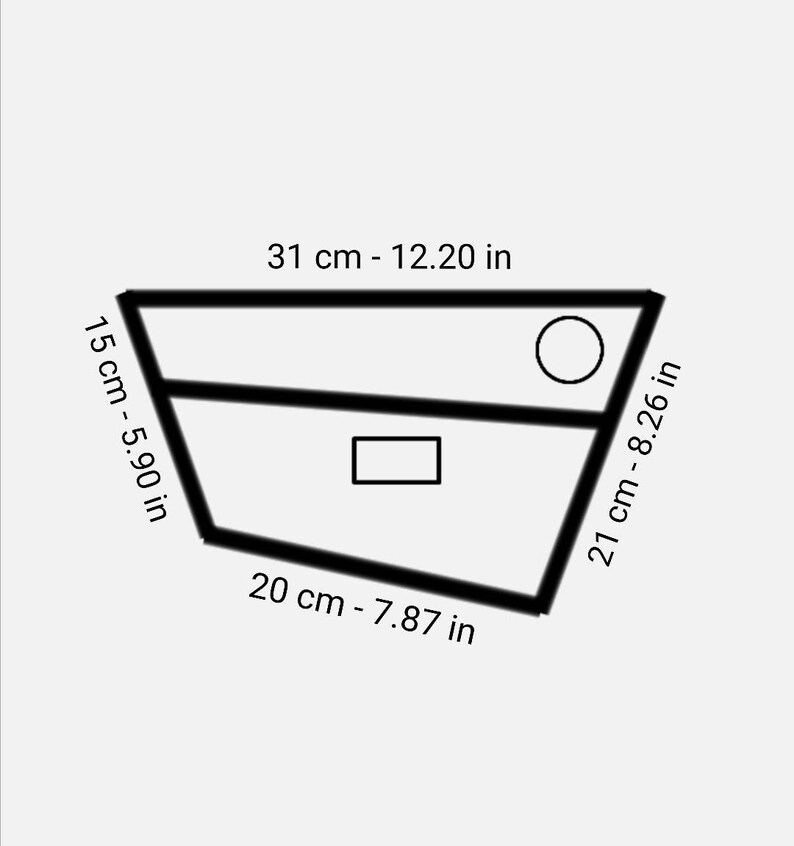 May include: A black and white line drawing of a geometric shape with measurements in inches and centimeters. The shape is a trapezoid with a circle and a rectangle inside.