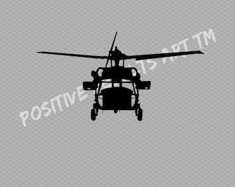 Może przedstawiać: Czarna sylwetka wojskowego helikoptera z łopatą rotora, widziana z przodu.