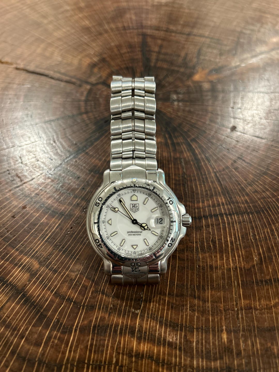 Montre TAG Heuer 6000 Series Professional WH1111 - Acier Inoxydable, Quartz, Occasion