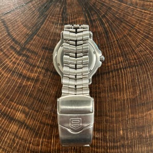 Montre TAG Heuer 6000 Series Professional WH1111 – Homme – Quartz – Boîtier Et Bracelet Acier – Occasion