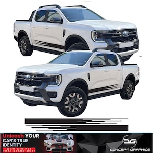 Puede incluir: Se muestran dos camionetas pick-up blancas con detalles negros y rayas negras. Las camionetas tienen ruedas negras y una baca negra. Una pancarta en la parte inferior dice "Unleash Your Car's True Identity" con la marca "Concept Graphics".