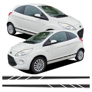 May include: Two white compact cars with black side stripes are displayed against a white background. Below the cars are two black stripe designs. The cars have black tires and silver rims.
