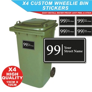 May include: Four black and white custom wheelie bin stickers with the number 99 and the text "Your Street Name". The stickers are 15 cm by 10 cm and are shown on a green wheelie bin.