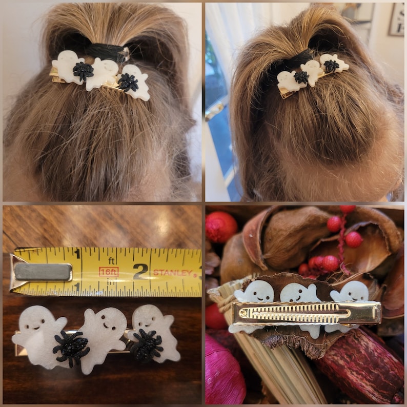May include: Three white ghost hair clips with black spider accents. The clips are on a gold base and are about 2 inches long.