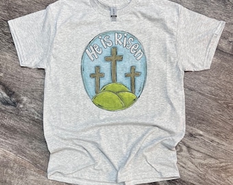 He Is Risen Three Crosses T-shirt - Jesus T-shirt - Easter Tee - Womens Graphic T-shirt - Hand Drawn Doodle Pastel Preppy Easter Tee Shirt