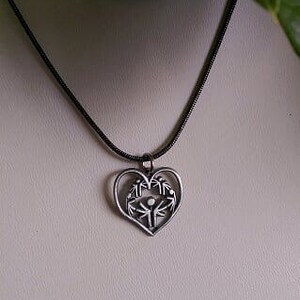 SPECIAL OLYMPICS // From the Heart Necklace // The heart is not symmetrical, symbolizing we are all different, but we are all beautiful. image 2
