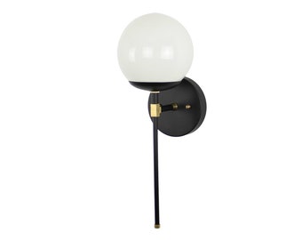 Modern wall sconce vanity lighting | Bedside glass globe light black and brass | Mid century modern wall hanging light fixture | Bathroom