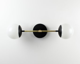 Mid century modern wall sconce light fixture black and brass |  Wall light fixture 2 white glass globes | Wall Lighting | Lighting fixtures