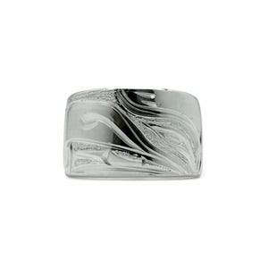 May include: A silver ring with an engraved design. The ring has a wide band with a detailed pattern of flowing lines and shapes. The design appears to be a stylized representation of natural elements.