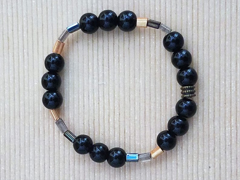 Handmade Stretchy Black /& Gold Bracelet with Hints of Silver and Clear Rectangular Beads