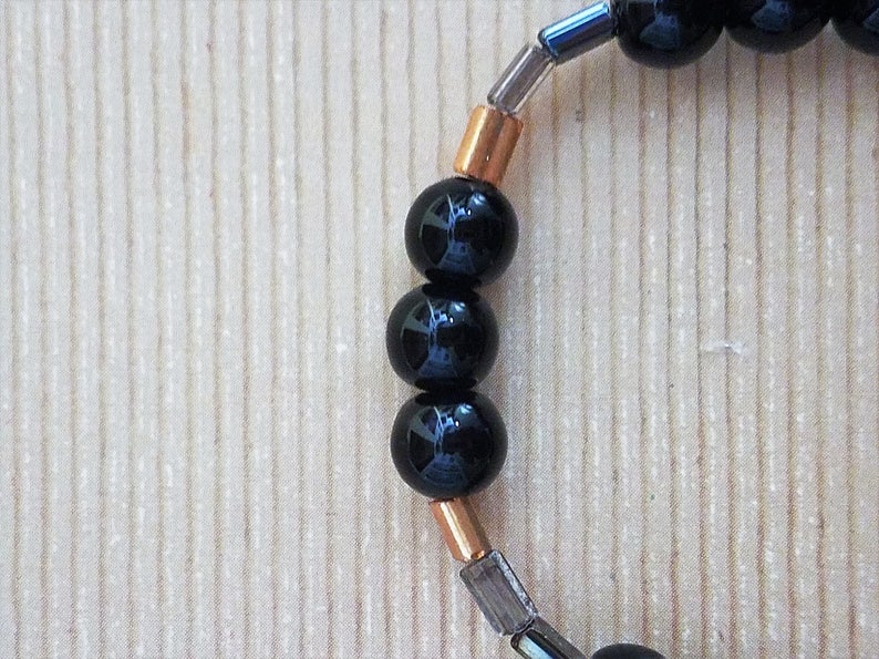 Handmade Stretchy Black /& Gold Bracelet with Hints of Silver and Clear Rectangular Beads