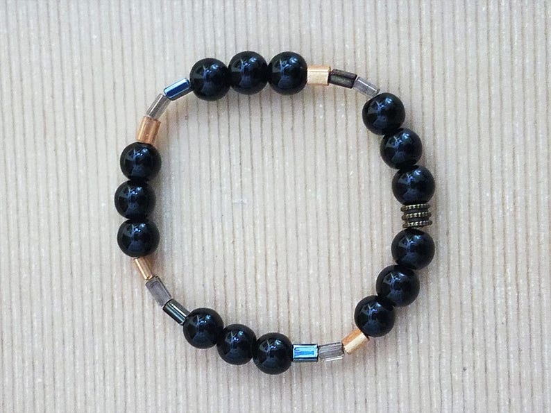 Handmade Stretchy Black /& Gold Bracelet with Hints of Silver and Clear Rectangular Beads