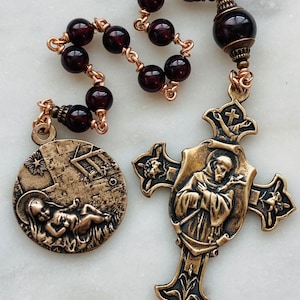 Christmas Rosary Tenner - Saint Francis and First Nativity - Garnets and Bronze