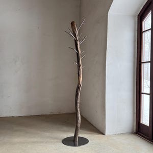 Elegant Freestanding Coat Rack – A Unique Fusion of Nature and Metal