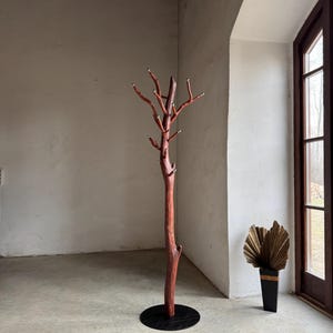 Handcrafted Standing Reclaimed Driftwood Coat Rack with Hazel Branch Hooks and Metal Knobs.
