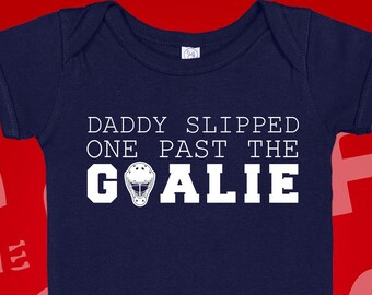 Hockey Baby Bodysuit: Daddy Slipped One Past The Goalie