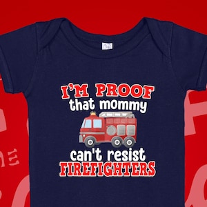 May include: Navy blue baby onesie with a red fire truck graphic and the text "I'm proof that mommy can't resist firefighters".