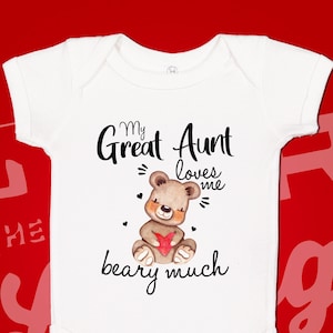 May include: White baby onesie with a brown teddy bear holding a red heart. The text reads "My Great Aunt loves me beary much".