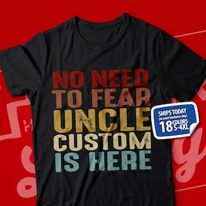 May include: Black t-shirt with a vintage-style graphic that says "No Need To Fear Uncle Custom Is Here".
