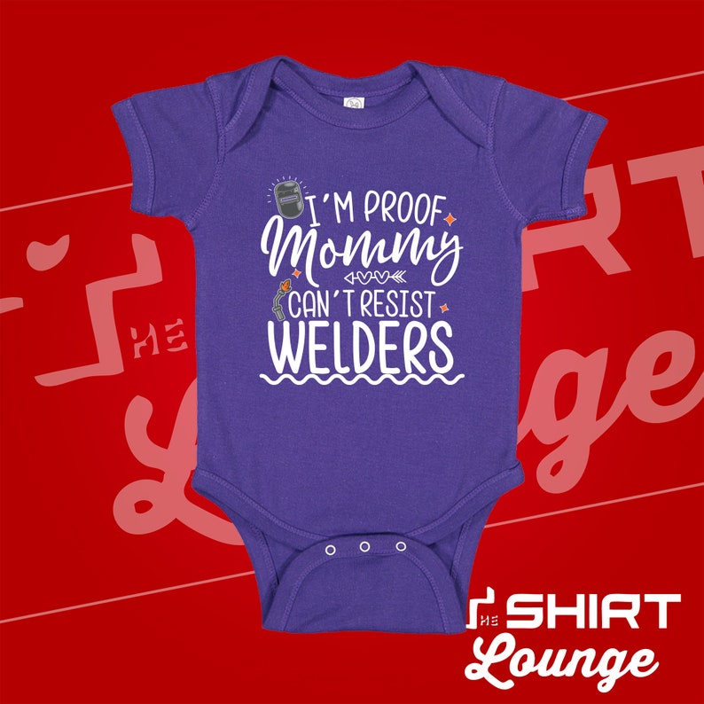 May include: Purple baby onesie with white text that reads "I'm proof mommy can't resist welders".