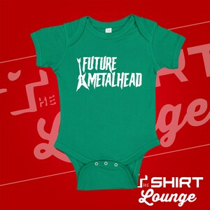 May include: A green baby onesie with a white graphic of a guitar and the text "FUTURE METALHEAD".